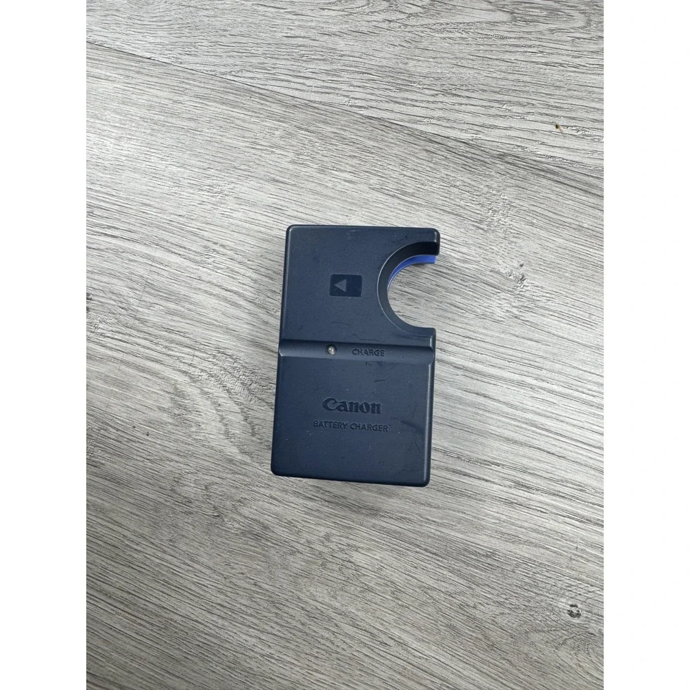 Canon OEM battery charger CB-2LS Power Shot S100 S200 S300 S400 S410 S500 876
